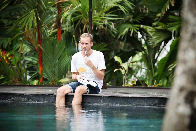 Bali Wedding- groom by the pool